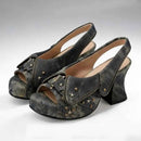 Pair of gray suede platform shoes with star and zipper details on a white background, Obroi