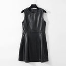 Black leather dress on a hanger against a white background, Obroi