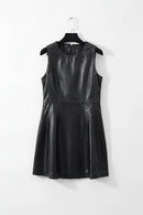 Black leather dress on a hanger against a white background, Obroi