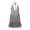 A gray halter-neck dress with a ruffled hem, decorated with silver rhinestone embellishments, shown against a plain white background, Obroi
