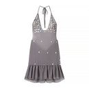 A gray halter-neck dress with a ruffled hem, decorated with silver rhinestone embellishments, shown against a plain white background, Obroi