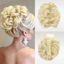 Blonde bridal hairpiece shown worn on a model's head, with two additional views of the hair bun accessory on a light gray background, Obroi