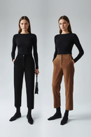 Two women wearing black tops and pants on a gray background, Obroi