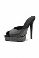 Black high-heeled shoe with rhinestone embellishments on a white background, Obroi