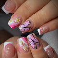 Nails with butterfly and flower design, featuring pink, white, and black colors, Obroi