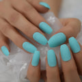 Close-up of hands with turquoise nail polish on a white lace background ,Obroi