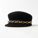 Black hat with a gold chain band on a white background, Obroi