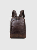Brown leather backpack on a light gray background, Obroi