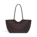 Woven brown handbag on a white background, Obroi