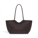 Woven brown handbag on a white background, Obroi