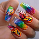 Nails with colorful butterfly design on a light background, Obroi