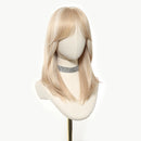 Blonde wig on a mannequin head with a white background, Obroi