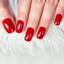 Close-up of hands with red nail polish on a white background, Obroi