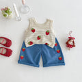Children's outfit with sleeveless top and shorts featuring strawberry patterns on a light background, Obroi