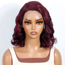 Mannequin head with burgundy wig on a white background, Obroi