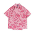 Pink camouflage shirt with 'FSK' logo and text on a white background