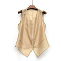 Beige vest on a wooden hanger against a white background, Obroi
