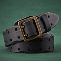 Black leather belt with a brass buckle on a green background, Obroi