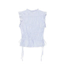 A light blue and white vertically striped sleeveless top with ruffled cap sleeves, a smocked bodice, and side drawstrings, shown against a plain white background, Obroi