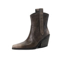 Brown leather boot with a wedge heel on a white background, Obroi