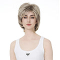 Person wearing a blonde wig on a white background, Obroi