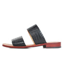 Black sandal with red sole on a white background, Obroi
