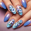 Nails with blue and purple floral design on a pink background, Obroi