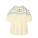Cream-colored blouse with intricate embroidery on a white background, Obroi