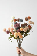 Bouquet of multicolored flowers on a plain background, Obroi