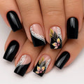 Nails with black and floral design on a white background, Obroi