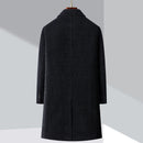 Black coat on a mannequin against a light gray background with Obroi branding.