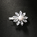 Jewelry clip with a pearl and crystal stones on a black background, Obroi