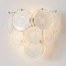 Modern wall light fixture with circular glass shades on a white background, Obroi