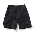 Black shorts with zippers on a white background, featuring the brand 'Obroi'.