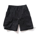 Black shorts with zippers on a white background, featuring the brand 'Obroi'.