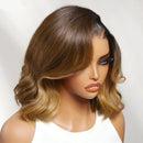 Mannequin head with a brown and blonde wig on a white background, Obroi