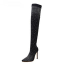 Black knee-high boot with rhinestone embellishments on a white background, Obroi