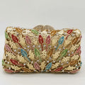 Decorative clutch bag with colorful leaf patterns on a white background, Obroi