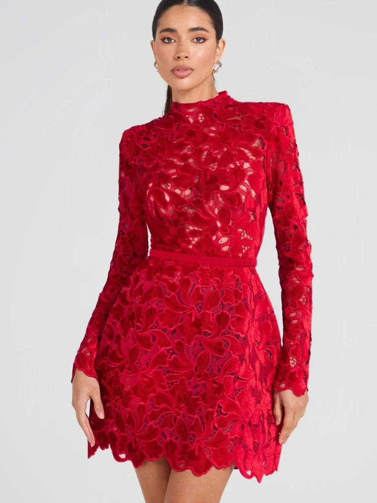 Red lace dress worn by a model on a gray , Obroi