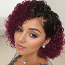 Woman with a stylish haircut featuring purple and black hair, wearing a necklace and earrings, Obroi