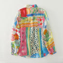 Colorful patterned shirt on a white background, Obroi