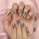 Hand with metallic gold nail polish on a pink background, Obroi