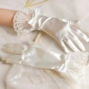 White satin gloves with lace cuffs on a white background, Obroi