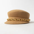 Brown hat with a gold chain band on a white background, Obroi