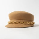 Brown hat with a gold chain band on a white background, Obroi
