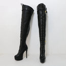 Black high-heeled knee boots with chain details on a white background, branded 'Obroi'.