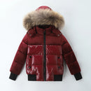 Red puffer jacket with fur hood on a white background, Obroi