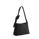 Black shoulder bag with a bow detail on a white background, featuring the Obroi brand.