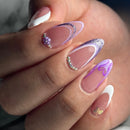 Close-up of a hand with decorative nails featuring pink, white, and purple colors, Obroi