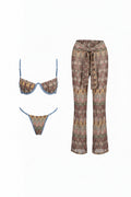 A coordinated swimwear set on a plain white background: a bikini with a geometric pattern and light blue trim, plus matching high-waisted tie-front pants in the same print, Obroi